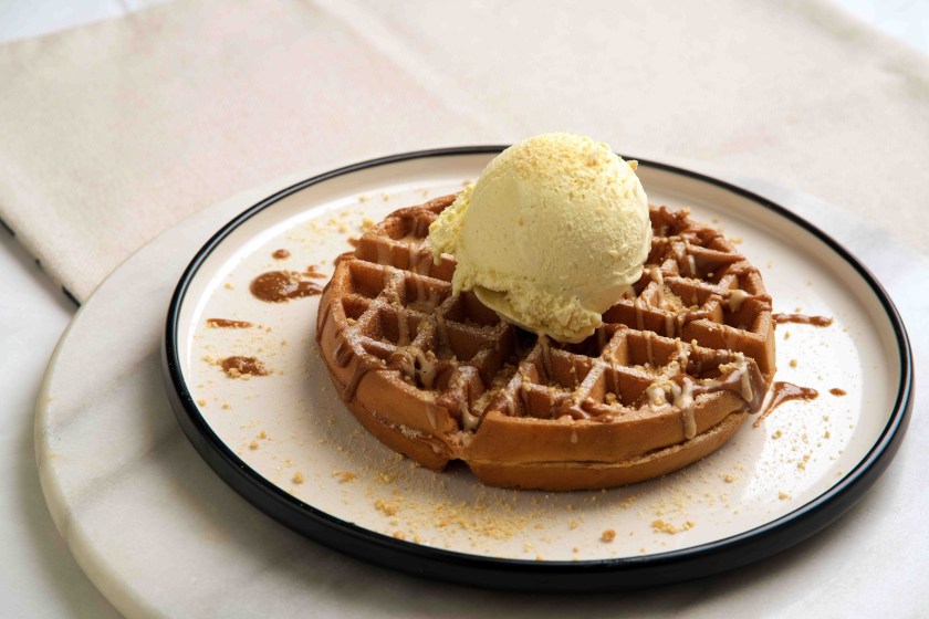 Strangers' Reunion - Buttermilk Waffles with Hazelnut Praline and Almond Crumble ($14.50)