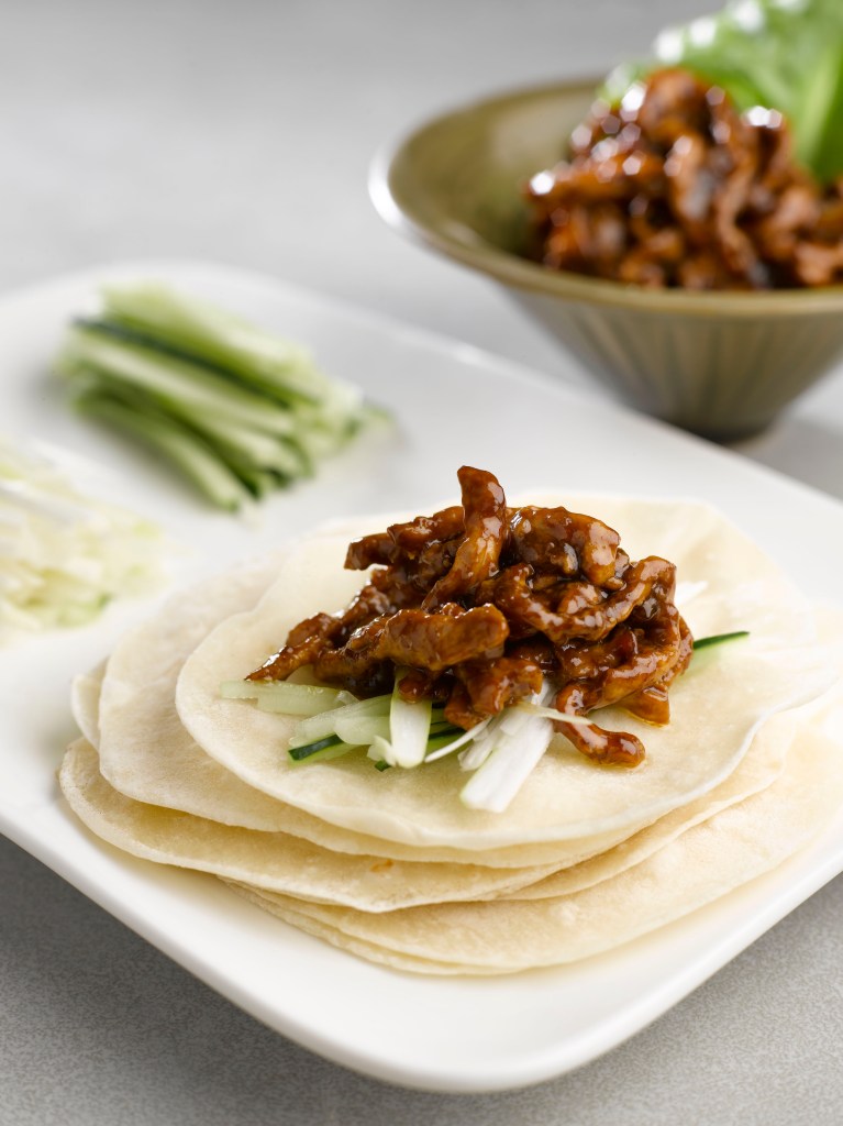 This image has an empty alt attribute; its file name is handmade-popiah-with-shredded-lean-pork-meat-e6898be5b7a5e89684e9a5bc.jpg