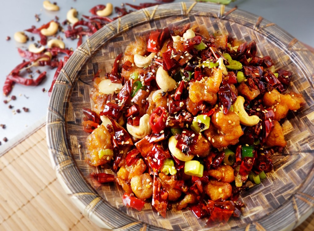 This image has an empty alt attribute; its file name is szechuan-spicy-chicken-e9a38ee591b3e8bea3e5ad90e9b8a1.jpg