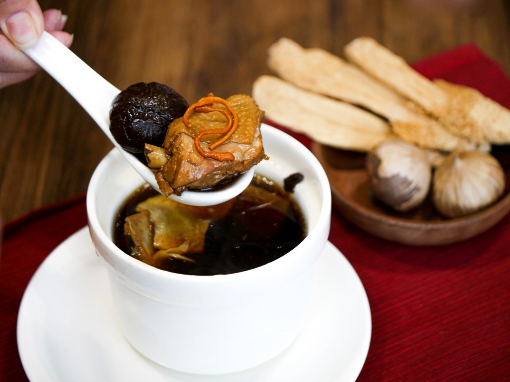 This image has an empty alt attribute; its file name is black-garlic-kampong-chicken-soup-.jpg