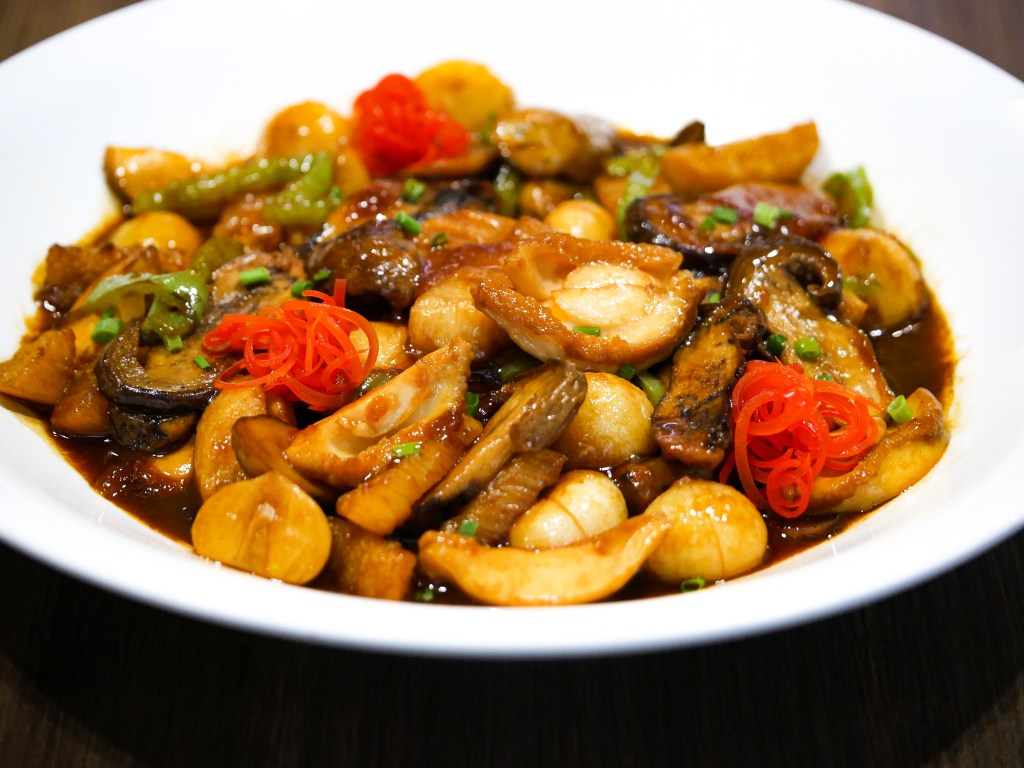 This image has an empty alt attribute; its file name is braised-abalone-with-wild-porcini-mushrooms.jpg